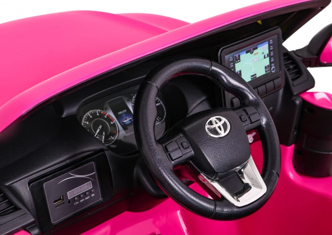 Toyota Hilux na baterie pro děti Růžová + pohon 4x4 + dálkové ovládání + 2 místa k sezení + rádio MP3 + LED