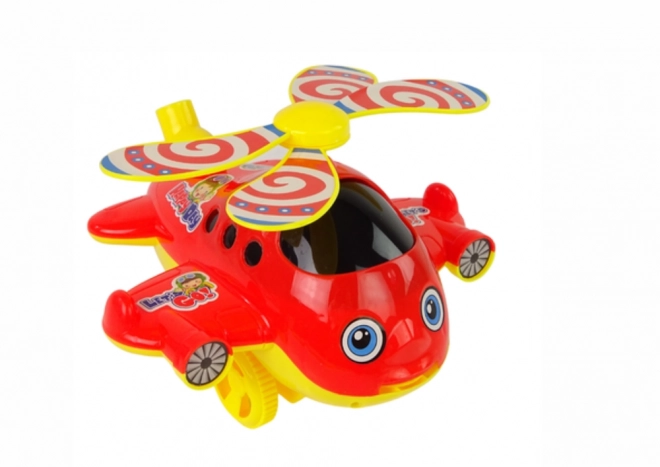 Veselá hračková helikoptéra s tyčkou