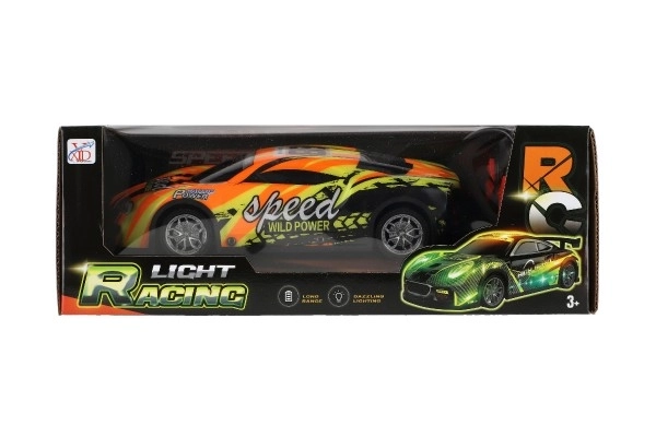 Auto RC závodní 27MHz plast 20cm na baterie se světlem 3 barvy v krabici 27x10x13cm