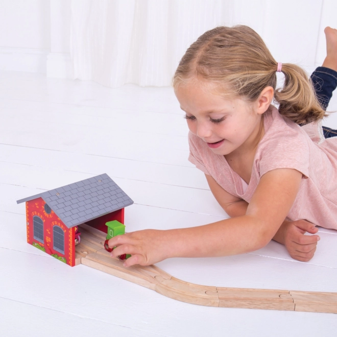 Dřevěné depo pro dva vlakové soupravy Bigjigs Rail