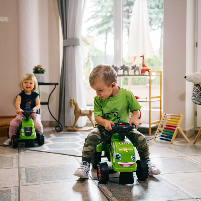 Odstrkovadlo traktor Claas zelené s volantem a valníkem