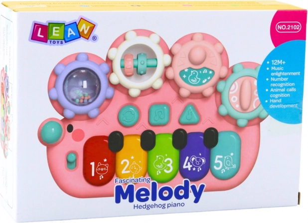 Interaktivní růžové piánko pro děti s ozubenými koly
