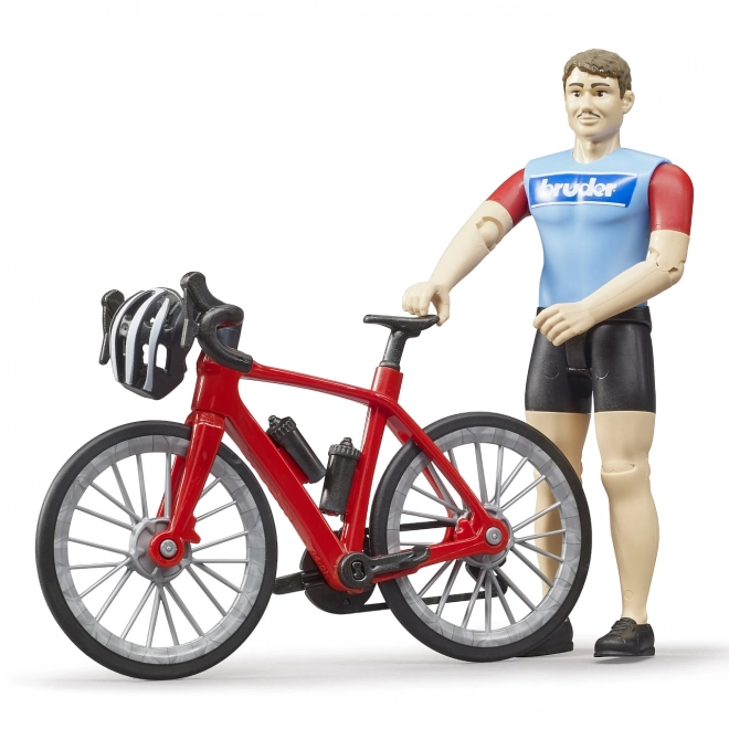 Silniční kolo s figurkou cyklisty