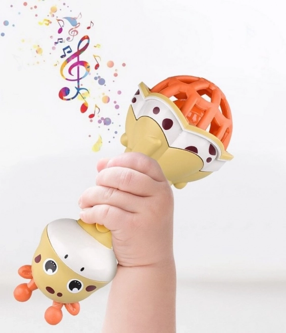 Sensoryční chrastítko žirafa s hudebními funkcemi Montessori