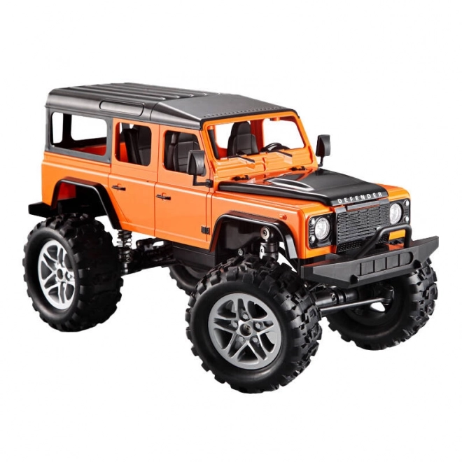 Dálkově ovládané auto Land Rover Defender 1:14 oranžové