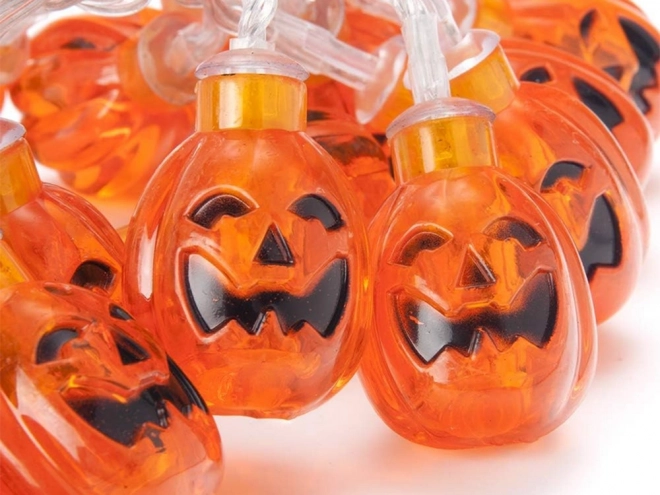 Závěsná LED dýňová girlanda na Halloween