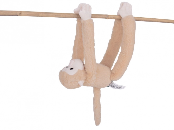 Závěsný maskot opice béžové barvy