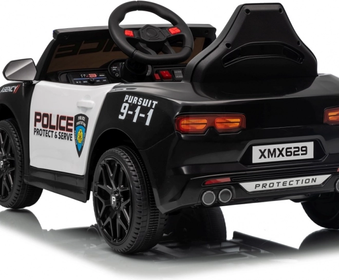 Černé policejní auto 911 Agentura