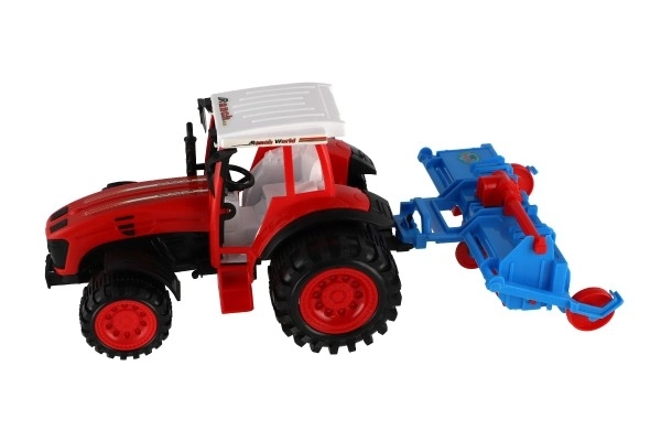 Traktor s vlekem s rotavátorem plast 52cm na setrvačník 2 barvy v blistru