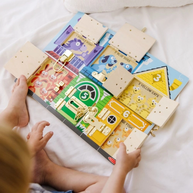 Zámky a bezpečnostní deska Melissa and Doug