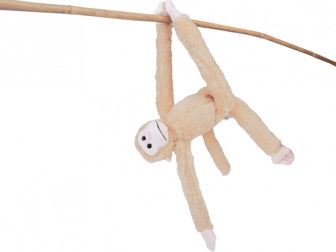 Závěsný maskot opice béžové barvy