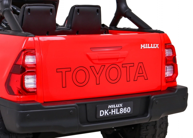 Toyota Hilux baterie pro děti Červená + pohon 4x4 + dálkové ovládání + 2 nosiče zavazadel + rádio MP3 + LED dioda
