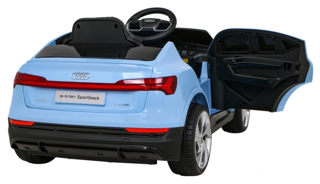 Audi E-Tron Sportback pentru copii + Pilot + tracțiune 4x4 + pornire lentă + radio MP3 + LED – Modrá