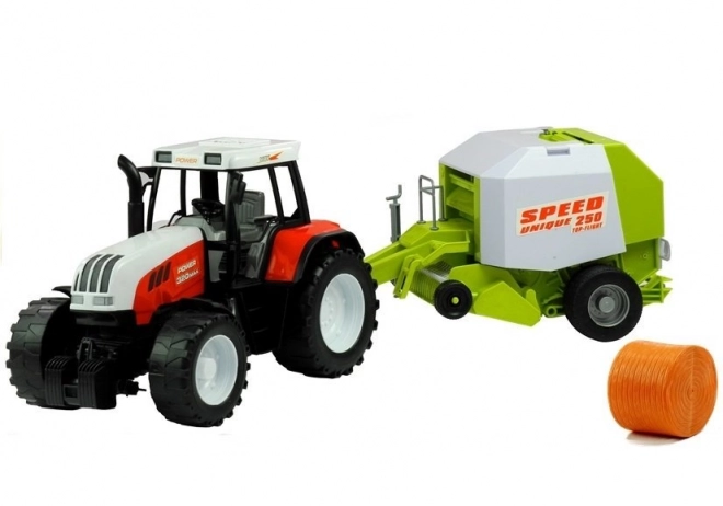 Velký zemědělský traktor s balírnou