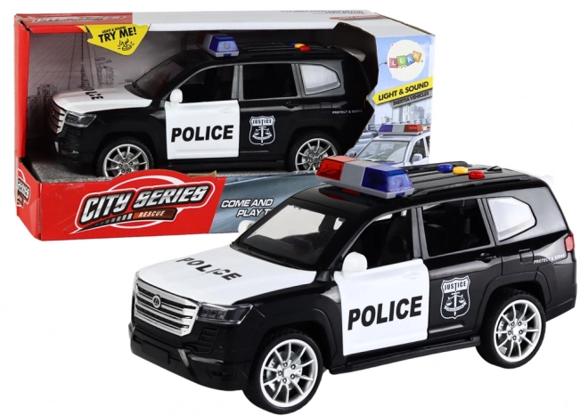 Policejní auto s efekty, otevíracími dveřmi a měřítkem 1:14