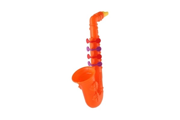 Saxofon plast 24cm 2 barvy v sáčku