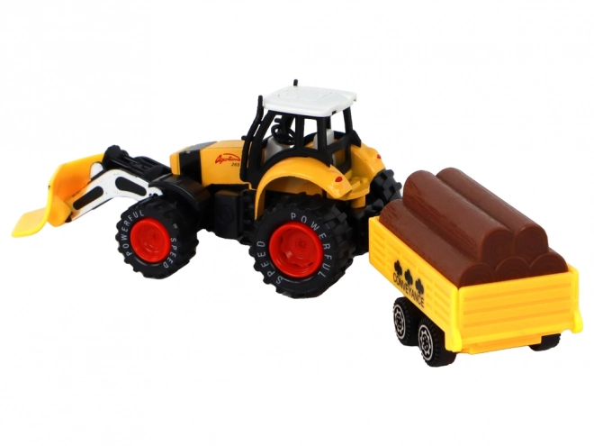 Traktor s přívěsem žlutý červený
