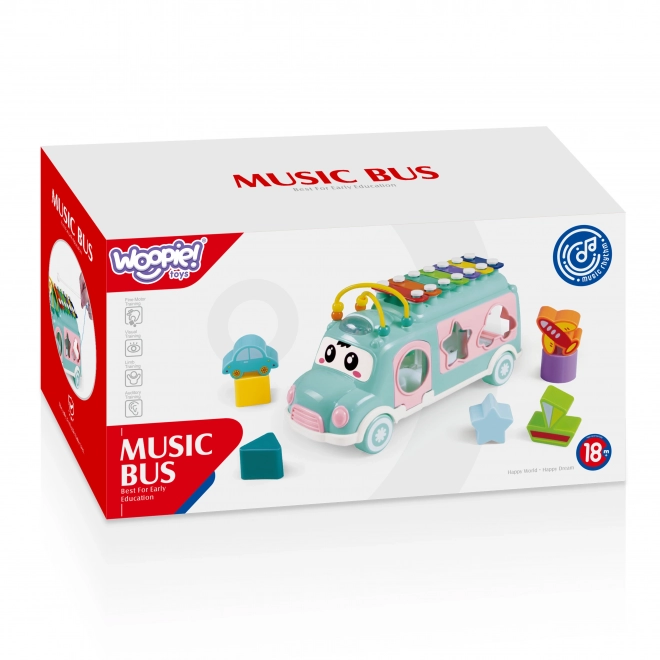 Woopie muzicírovací auto se zeleným sorterem a xylofonem