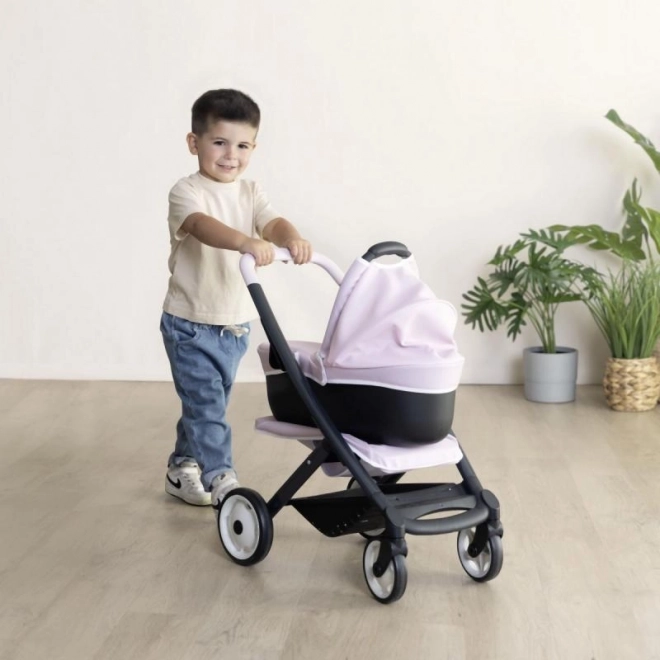 Kočárek pro panenky Maxi-Cosi světle růžový