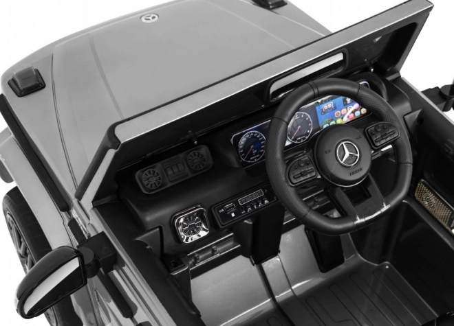 Mercedes AMG G63 pro děti Stříbrný lak + dálkové ovládání + MP3 LED + pomalý start + EVA + pásy