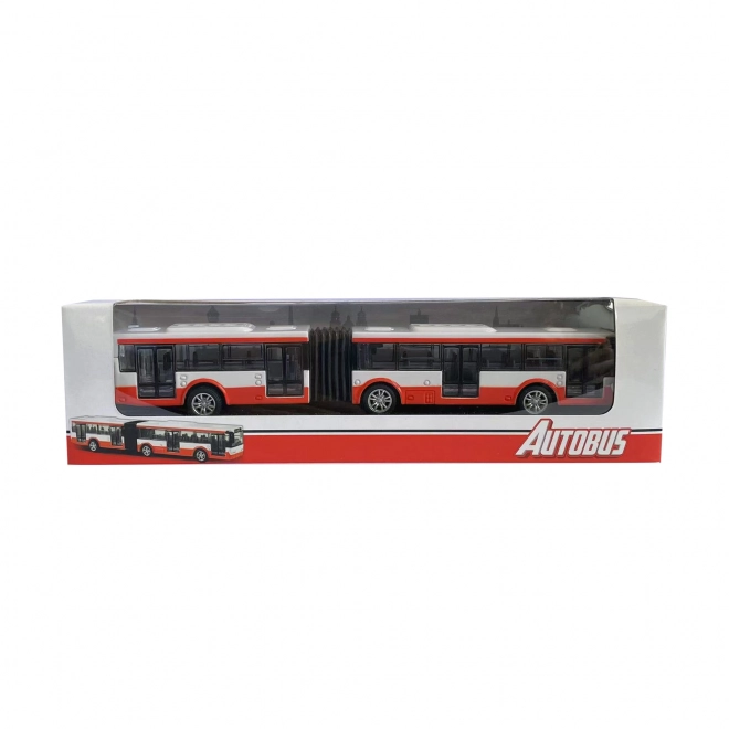 Kovový červený kloubový autobus