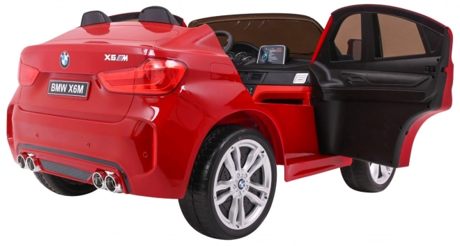 BMW X6M XXL pro 2 děti Červený lak + dálkové ovládání + eko kůže + bezpečnostní pásy + pomalý rozjezd + MP3 + LED
