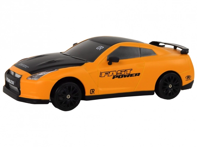 Dálkově ovládané sportovní auto R/C 1:24 vyměnitelná kola – žluté