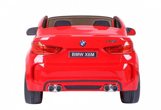 BMW X6M XXL pro 2 děti Červená + dálkové ovládání + eko kůže + bezpečnostní pásy + pomalý rozjezd + MP3 USB + LED dioda