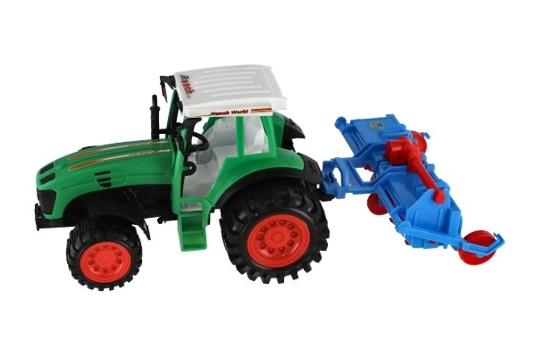 Traktor s vlekem s rotavátorem plast 52cm na setrvačník 2 barvy v blistru