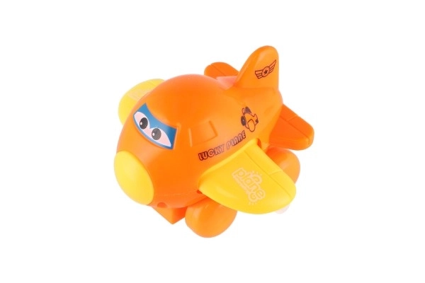 Letadlo s očima mávající křídla na klíček plast 8cm mix barev