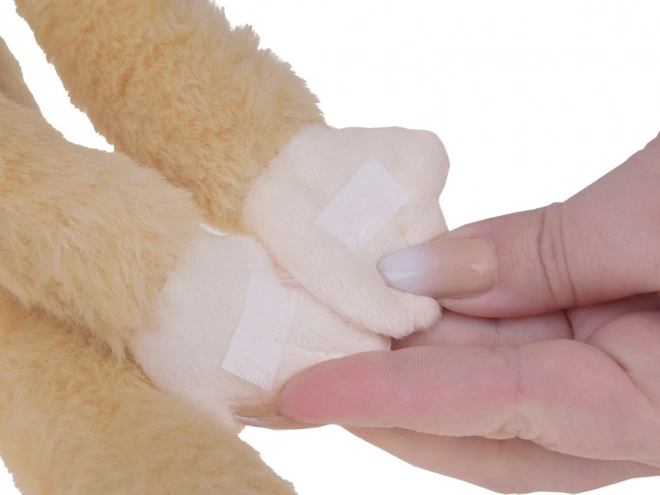 Závěsný maskot opice béžové barvy