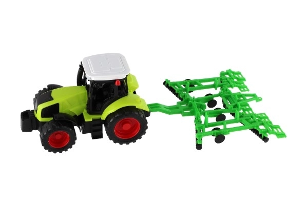 Dětský traktor s třemi vleky