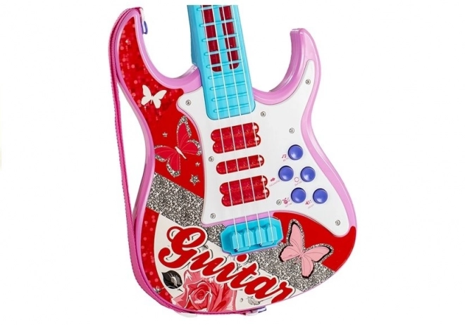 Elektrická kytara s mikrofonem pro malé rockové hvězdy