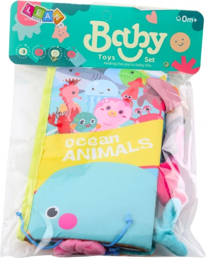 Šustící stránky a pískátko pro smyslovou zábavu