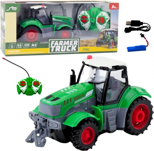 Zelený zdaleka ovládaný traktor 1:24