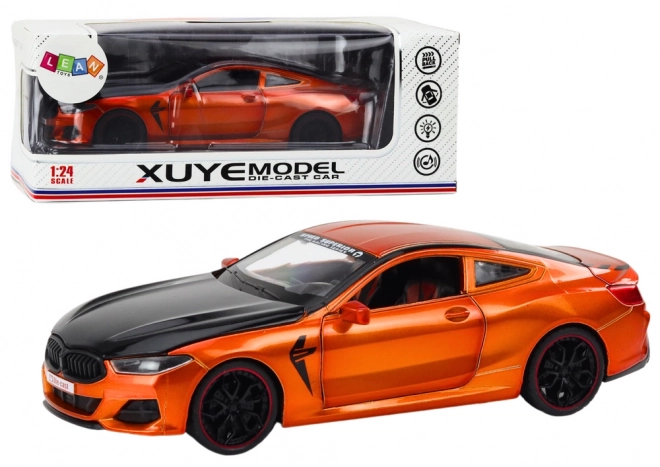 Kovový sportovní model s třecím pohonem a otevíracími prvky 1:24 oranžový
