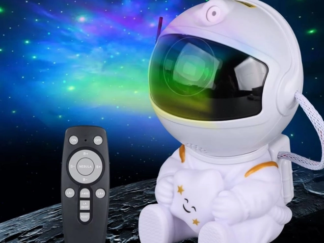 Hvězdný projektor sedící astronaut s dálkovým ovládáním