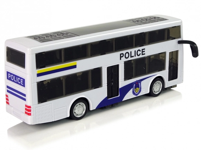 Policejní dvoupatrový bílý autobus se zvukem tahu