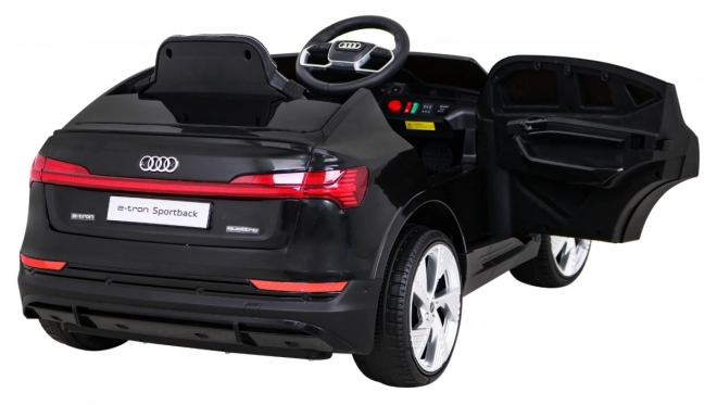 Audi E-Tron Sportback pentru copii + Pilot + tracțiune 4x4 + pornire lentă + radio MP3 + LED – Černá