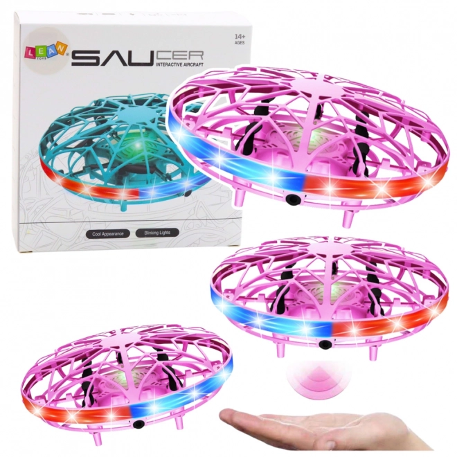 Růžový ručně ovládaný UFO dron s LED světly