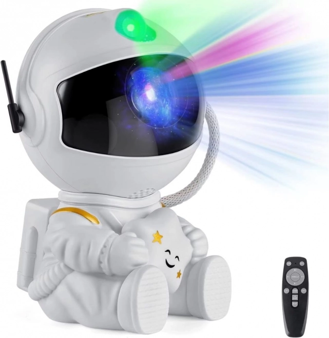 Hvězdný projektor sedící astronaut s dálkovým ovládáním