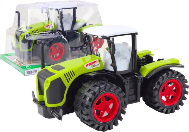 Velký zelený farmářský traktor s třecím pohonem