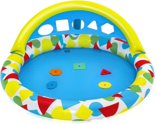 Učení hrou: sorter tvarů ve stříšce