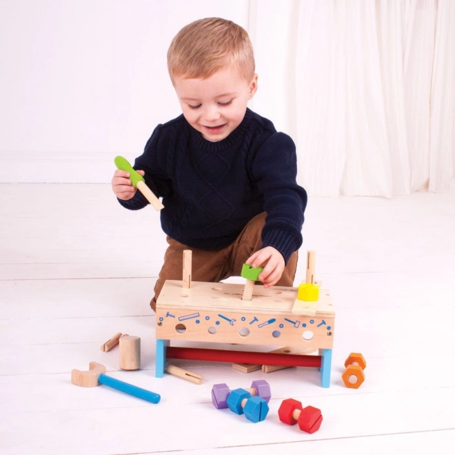 Dřevěný ponk a přepravka na nářadí 2v1 Bigjigs Toys