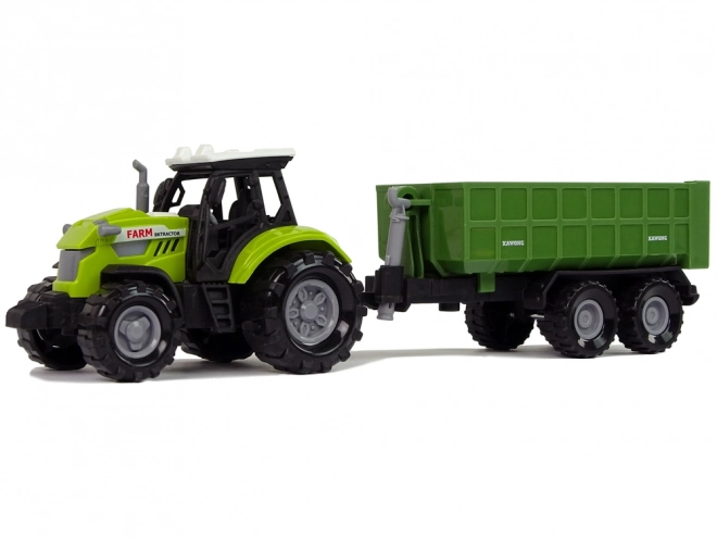 Traktor s odpojitelným přívěsem zelený