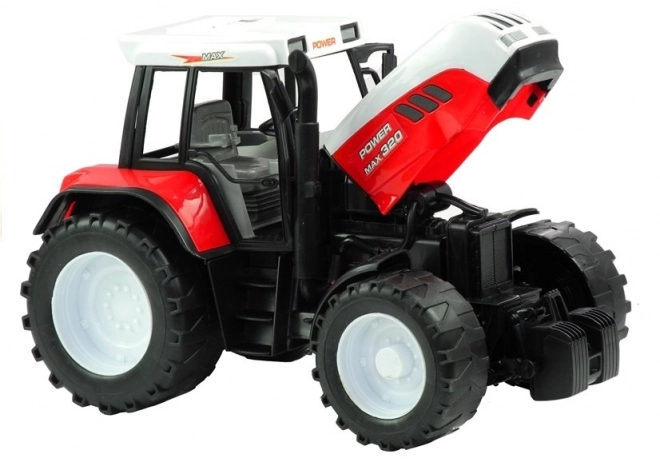 Velký zemědělský traktor s balírnou