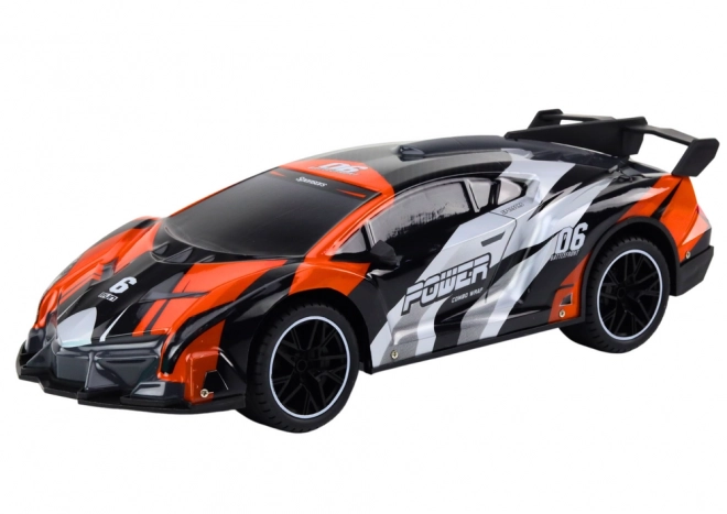 Dálkově ovládané RC sportovní auto 1:10 oranžové Rychlost 25 km/h