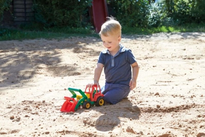 Barevný plastový traktor s přední lžící