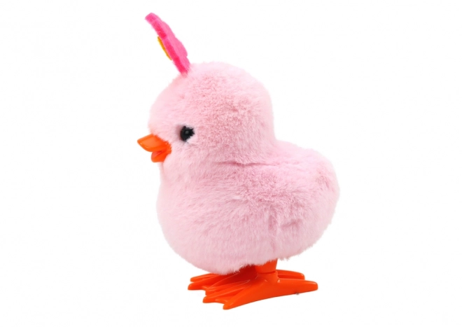 Růžový skákající kvítek na klíček