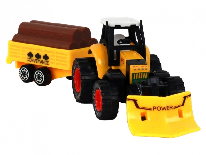 Traktor s přívěsem žlutý červený